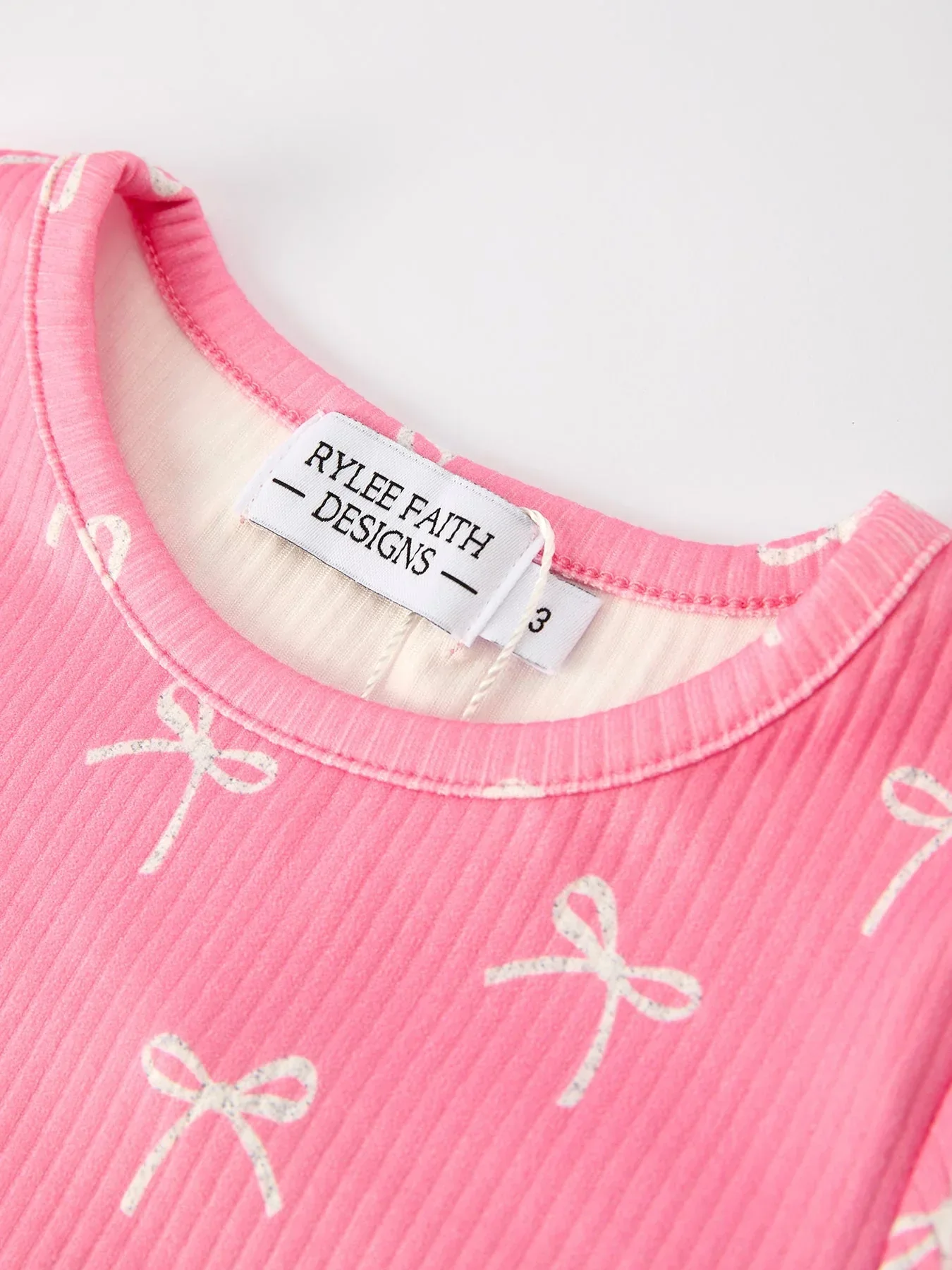 Christmas Girls Pink Bow Pajama Set: Comfy and Cute - Image 4