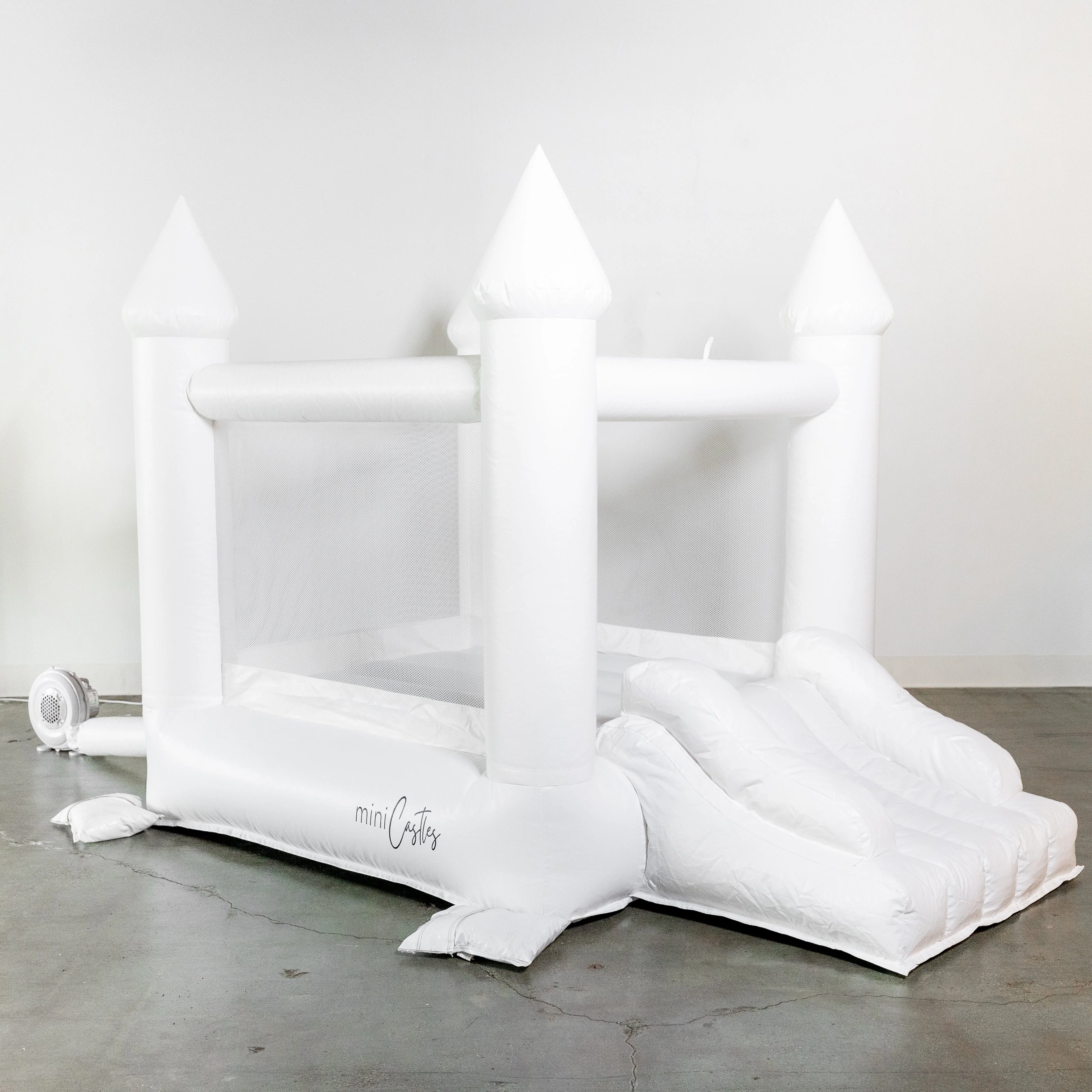 Mini Ava - White Bounce House with Cone Tops - Image 2
