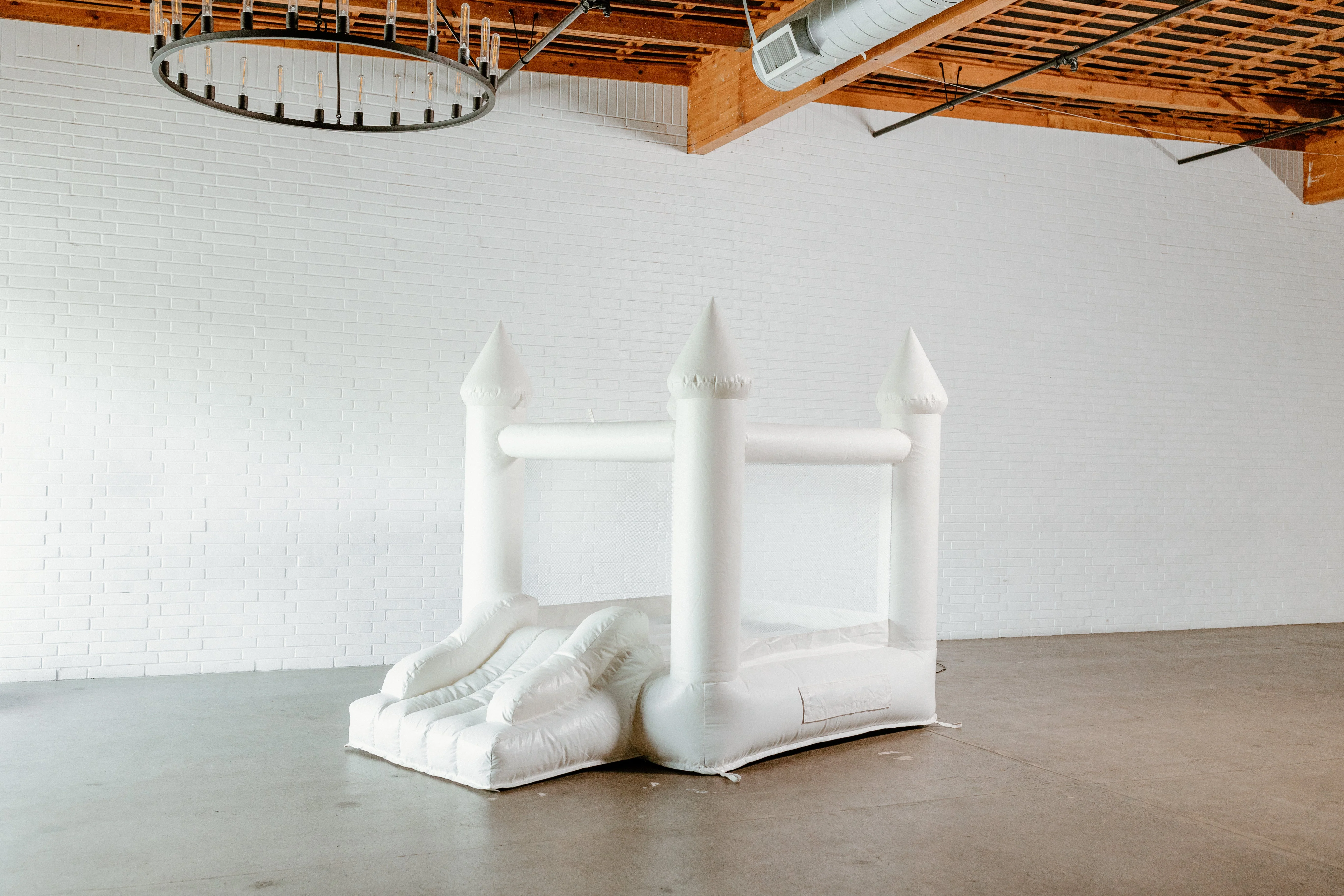 Mini Ava - White Bounce House with Cone Tops - Image 7