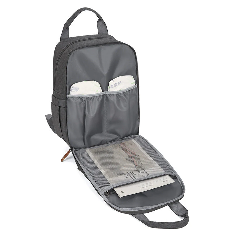 Multi-functional Diaper Bag With A Baby Changing Pad And A Warming Compartment - Image 2