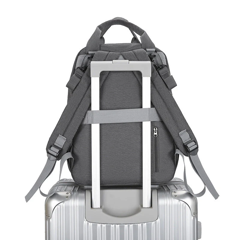 Multi-functional Diaper Bag With A Baby Changing Pad And A Warming Compartment - Image 3