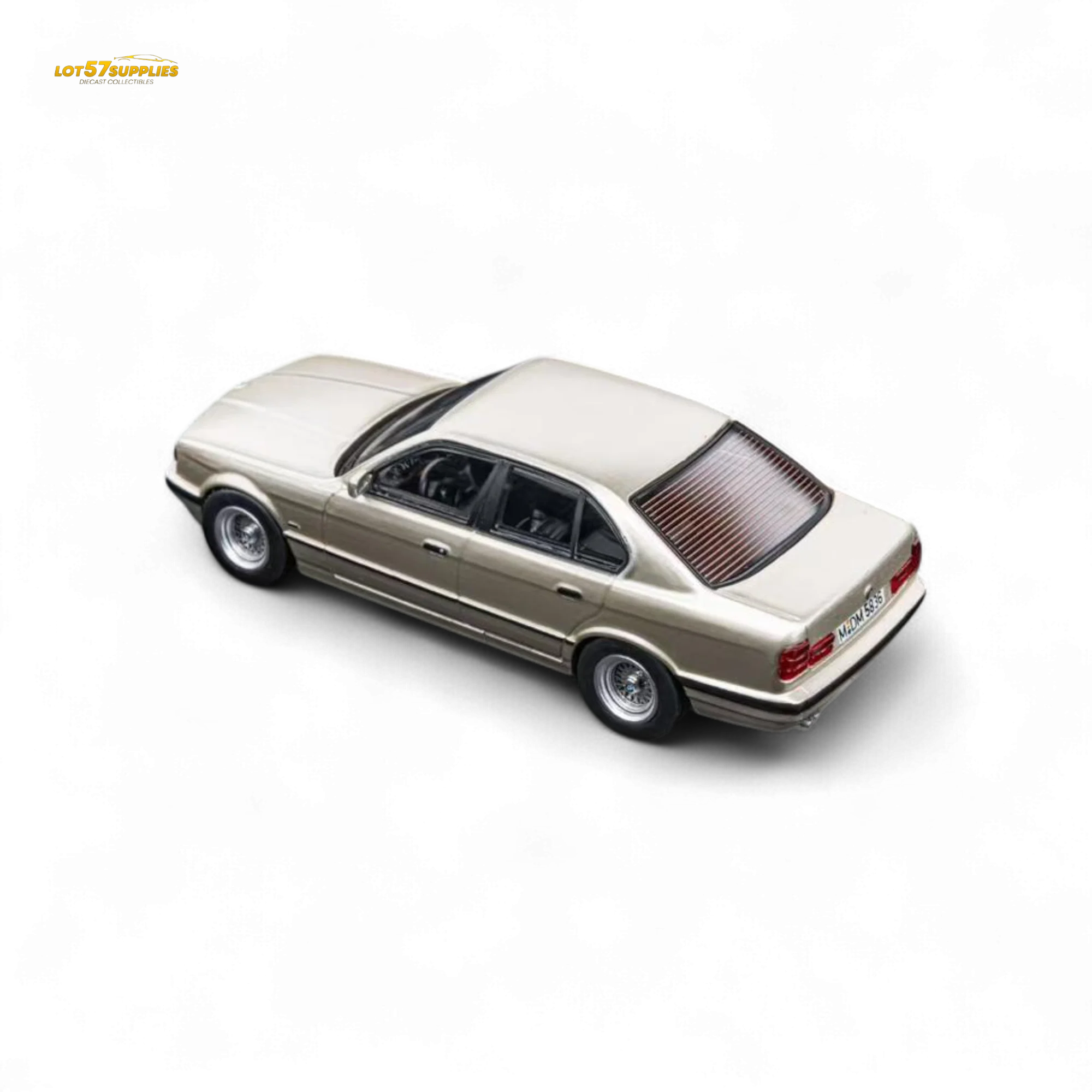 (Pre-Order) DCM BMW E34 5-Series Sedan Cashmere Beagle Gold 1:64 - Image 4