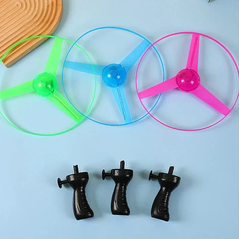 Pull Wire Glow UFO – Spinning LED Flyer Toy for Kids Outdoor Fun - Image 3
