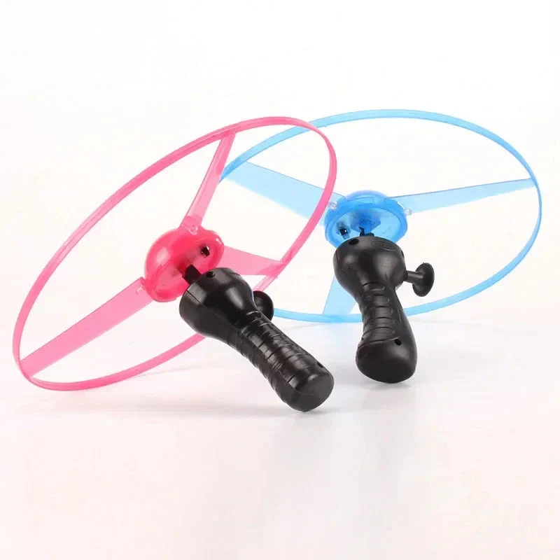 Pull Wire Glow UFO – Spinning LED Flyer Toy for Kids Outdoor Fun - Image 5