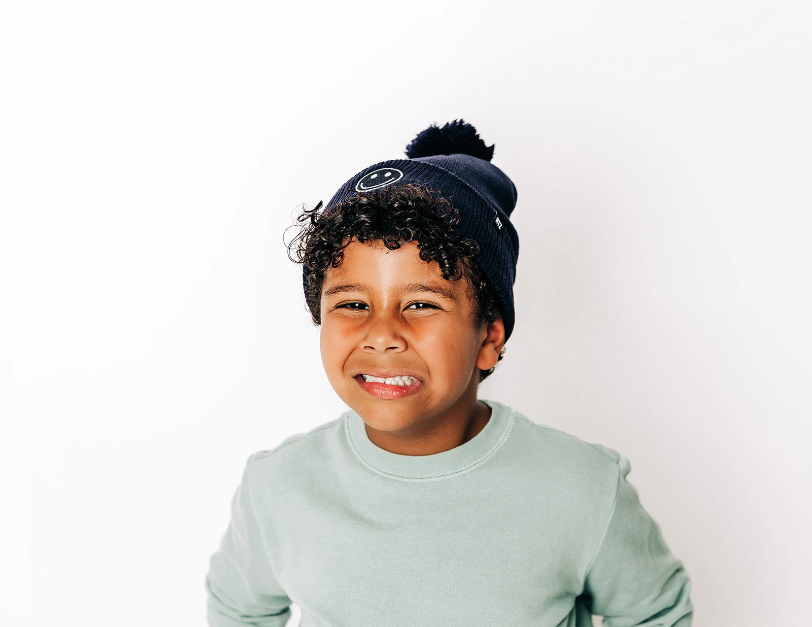 Smiley Pom Pom Hat - Image 31