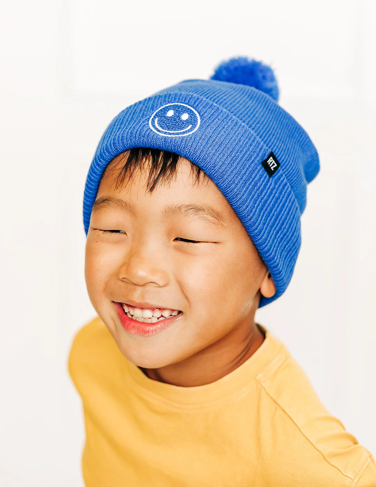 Smiley Pom Pom Hat - Image 34