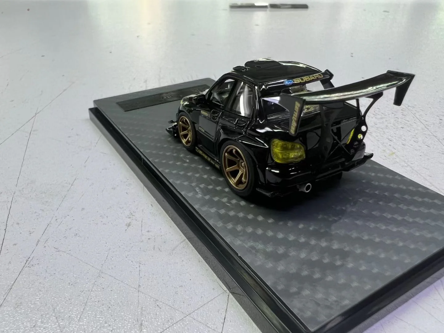 YM Model Subaru Impreza WRX STI Voltex Black Gold 1:64 - Image 5